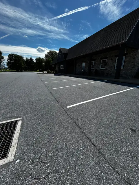 Fresh white stall lines in a stone building lot