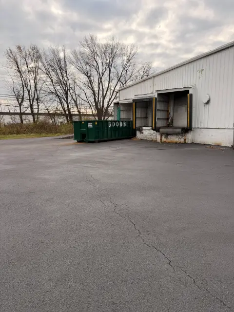 Warehouse loading dock apron with sealed asphalt